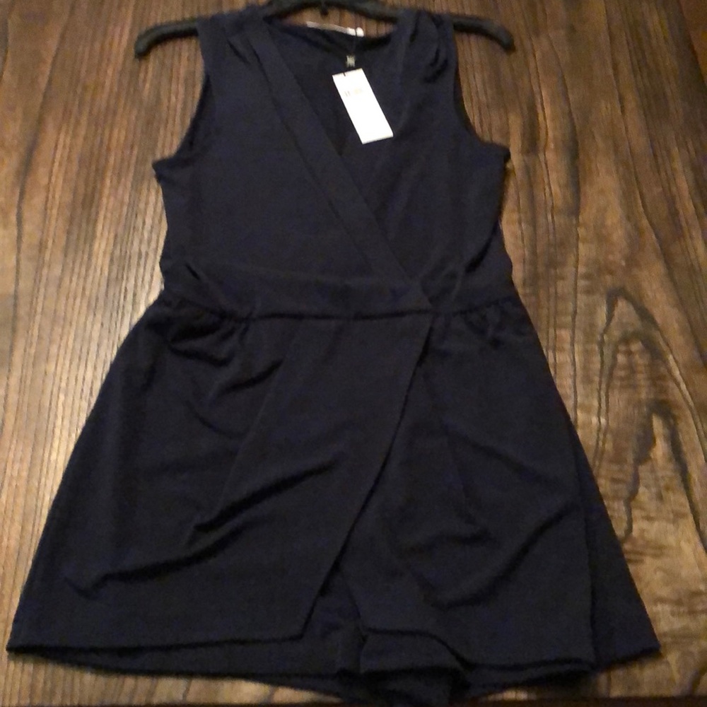 Navy BCBG asymmetrical romper.
